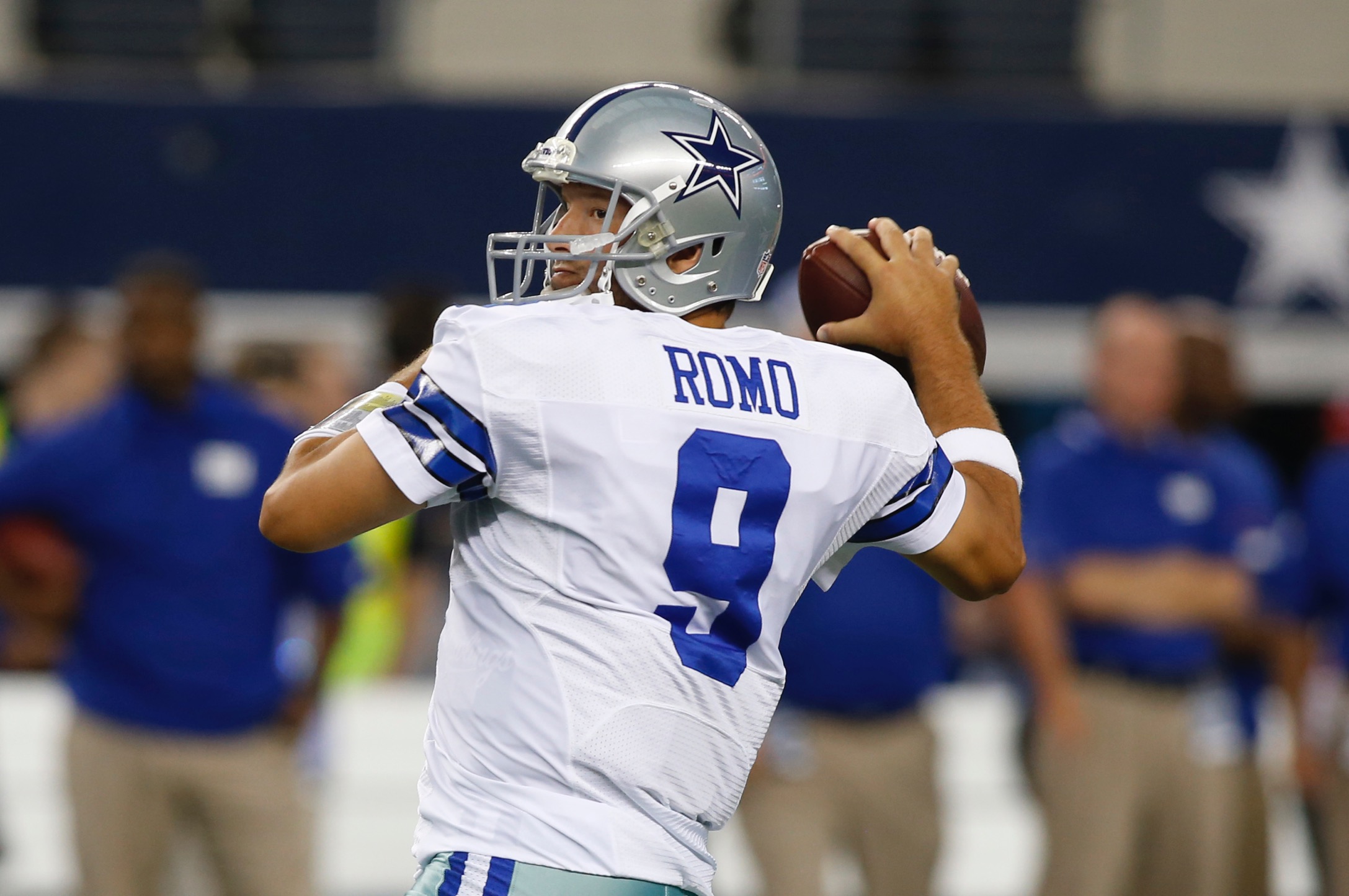Sep 8, 2013; Arlington, TX, USA; Dallas Cowboys quarterback Tony Romo (9) warms up before the game against the New York Giants at AT&T Stadium. Mandatory Credit: Tim Heitman-USA TODAY Sports